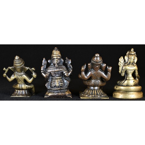 5371 - An Indian bronze domestic shrine figure, cast as Ganesh, lotus base, 8cm high, 19th century; others ... 