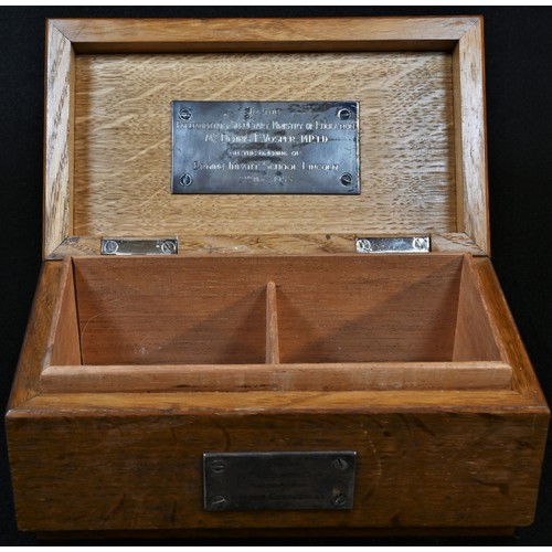 5399 - Architectural Heritage - a salvaged oak cheroot casket, hinged cover, the front applied with a plaqu... 