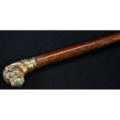 5346 - An early 20th century novelty parasol, the pommel ad the head of a dog, 91cm long