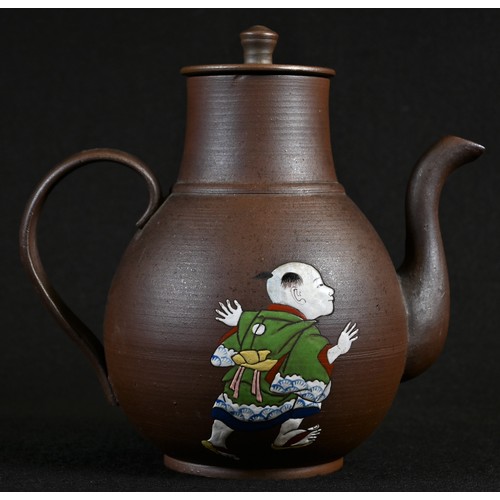 5109 - A Chinese yixing pear shaped teapot, decorated in polychrome enamels with the 'Hundred Boys', charac... 