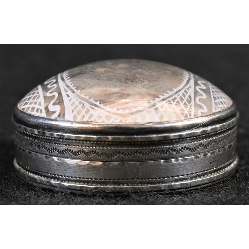 5129 - A George III silver circular pill box, the domed 'faux rock crystal' cover set with a portrait minia... 