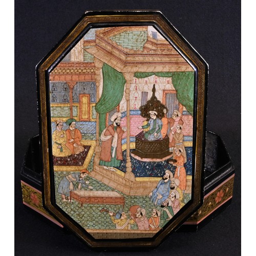 5233 - A Persian lozenge shaped box, hinged cover decorated in polychrome with a court scene, the sides wit... 