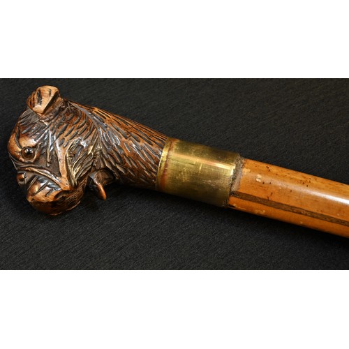 5321 - An early 20th century Black Forest automaton walking cane, the handle carved as the head of a dog, m... 