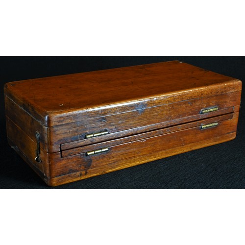 5360 - An Edwardian mahogany travelling chess set, folding diptych board, 21cm wide, c.1910