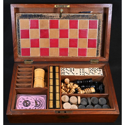 5357 - An Edwardian mahogany games compendium, hinged cover enclosing chess board, solitaire and an arrange... 