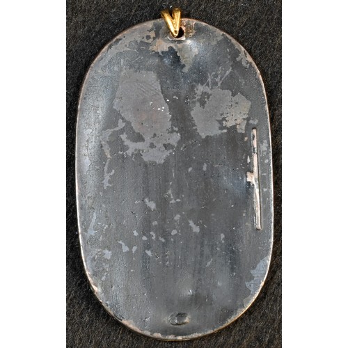 5153 - A Japanese mixed metal oval plaque or pendant, applied in silver and bi-colour bronze with cranes, a... 