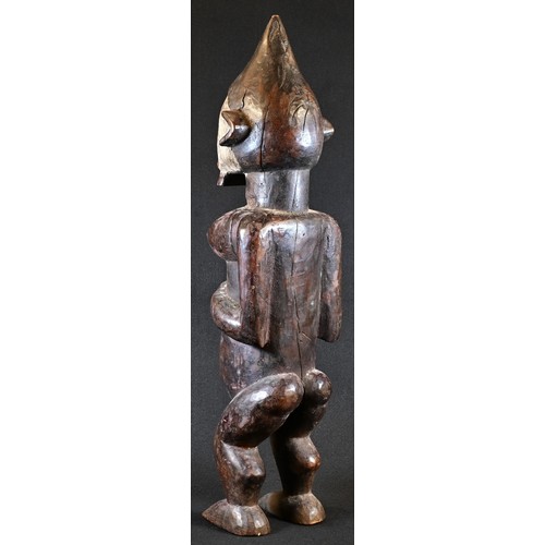 5748 - Tribal Art - a Dan figure, standing, with hermaphroditic physiology, stylised scarified features dec... 