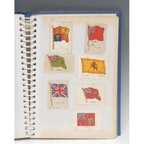 5839 - A collection of World War I and later cigarette silks, mostly regimental and military, some statesme... 