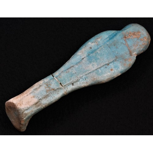 5714 - Antiquities - an Ancient Egyptian turquoise faience ushabti (shabti), incised with hieroglyphs, 12cm... 