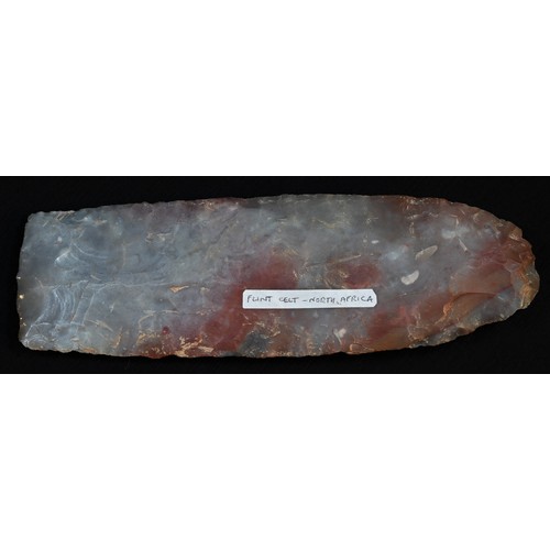 5728 - Antiquities - Stone Age, a North African red flint celt, 18cm long, Mali, North Africa, Neolithic, [... 