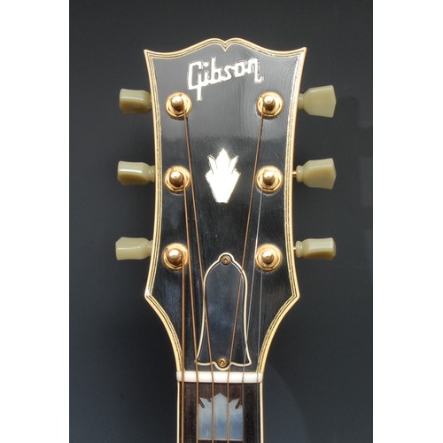 5285B - A Gibson J200 acoustic guitar, USA, natural tobacco sunburst finish, gold hardwear. Serial number SE... 