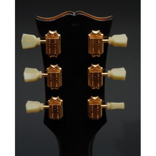 5285B - A Gibson J200 acoustic guitar, USA, natural tobacco sunburst finish, gold hardwear. Serial number SE... 