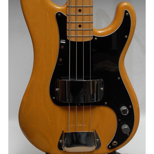 5285H - A Fender Precision electric bass guitar USA, natural wood body, maple neck, black pickguard. Serial ... 