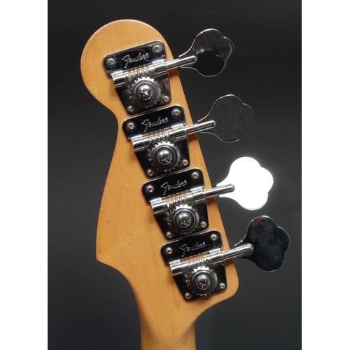 5285H - A Fender Precision electric bass guitar USA, natural wood body, maple neck, black pickguard. Serial ... 