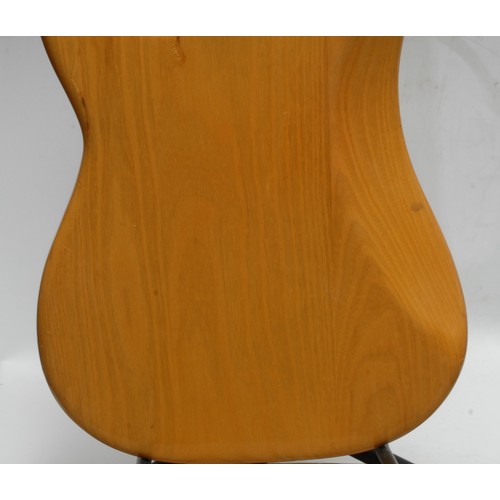 5285H - A Fender Precision electric bass guitar USA, natural wood body, maple neck, black pickguard. Serial ... 