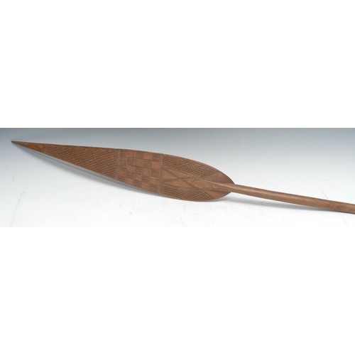 5495 - Tribal Art - a Polynessian paddle club, pointed leaf shaped blade, 143cm long