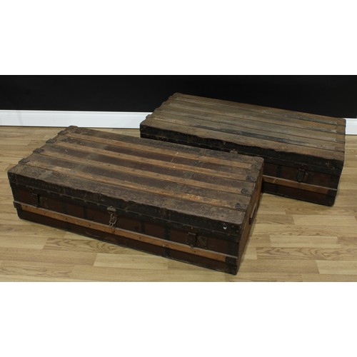 1508 - A pair of 19th century metal-clad rectangular travelling trunks, hinged covers, 30cm high, 116cm wid... 