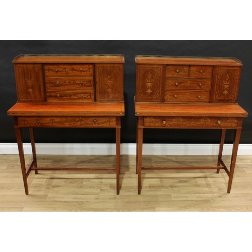 1521 - A pair of Edwardian Sheraton Revival mahogany bonheur du jours, each with rectangular superstructure... 