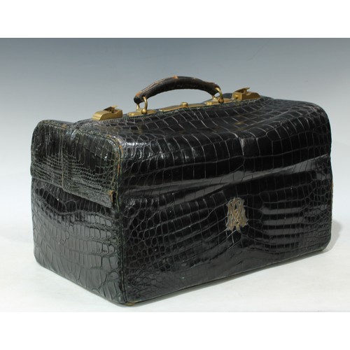 A late Victorian crocodile leather Gladstone bag travelling case, by Drew &  Sons, Piccadilly Circus