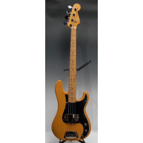 1496 - A Fender Precision electric bass guitar USA, natural wood body, maple neck, black pickguard. Serial ... 