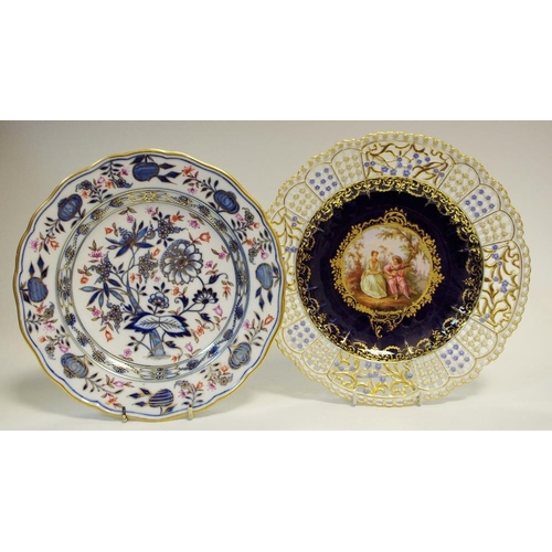 A 19th century plate, central medallion of guitarist and