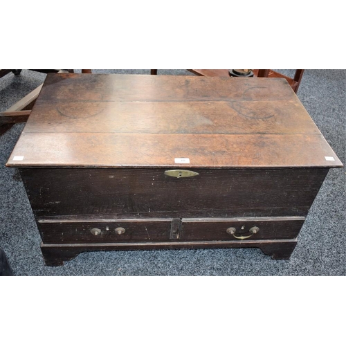 10 - A late 18th century oak mule chest, hinged rectangular top above a pair of short drawers, bracket fe... 