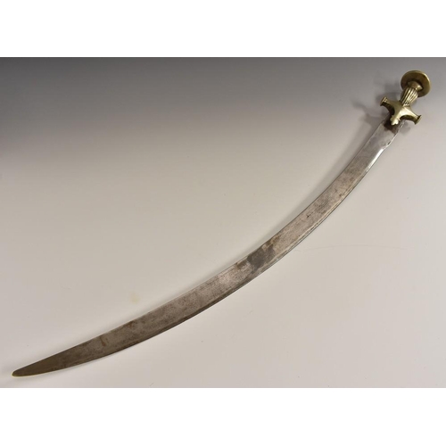 3257 - An Indian tulwar, 73cm curved blade, base metal hilt with fluted grop and disc pommel, 85cm long, 19... 