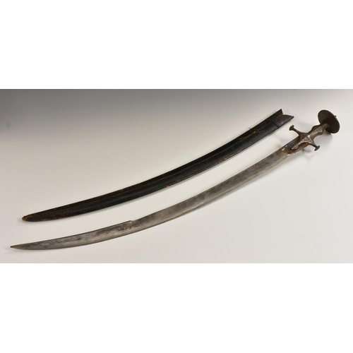 3260 - An Indian tulwar, 74cm curved blade, iron hilt with disc pommel, traces of red decoration, leather s... 