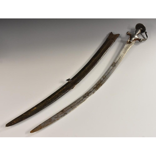 3262 - An Indian tulwar, 76cm curved blade, iron knuckle bow guard with disc pommel, leather scabbard, 88cm... 