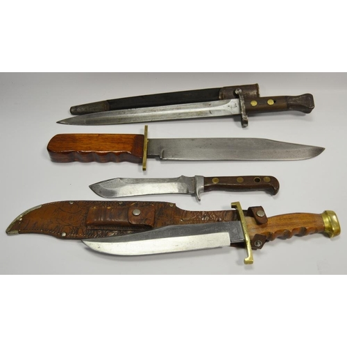 391 - A WWII bayonet; a Solinger Bowie knife; a German knife; a Bowie knife (4)