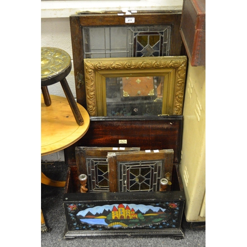 411 - A vintage wireless radio cabinet painted in the Toleware manner; a pair of oak barleytwist candlesti... 