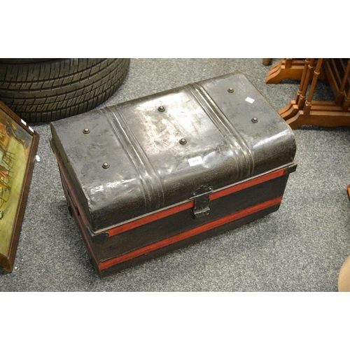 414 - A dome topped tin trunk