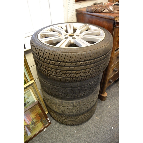 415 - Four 22'' Landrover wheels and tyres.