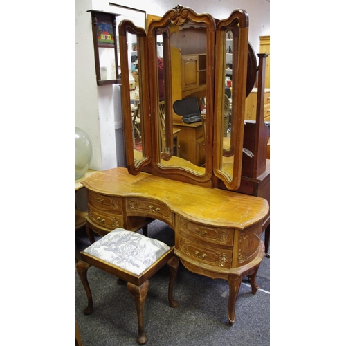 440 - A mahogany dressing chest, oval mirror, shelf and two drawers to superstructure, two short drawers o... 