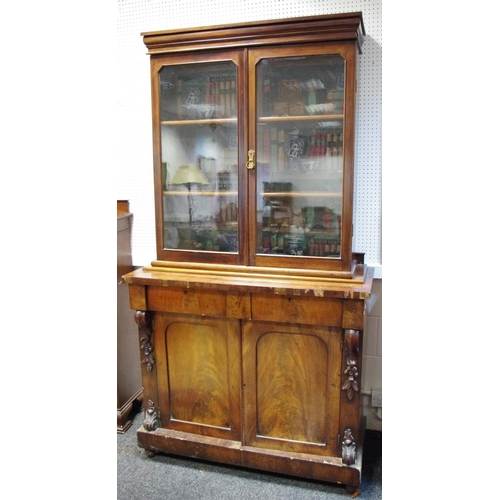 464 - A Victorian mahogany bookcase cabinet, glazed doors to top, long drawer over two door cupboards to b... 