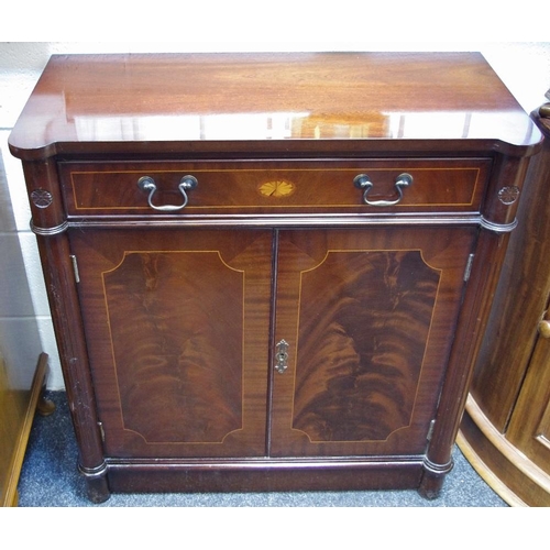 467 - A reproduction mahogany side cabinet, long drawer over two door cupboard