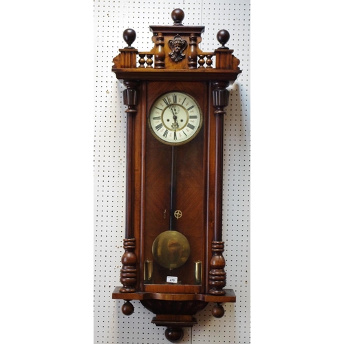 470 - A late 19th century walnut Vienna wall clock, double weighted