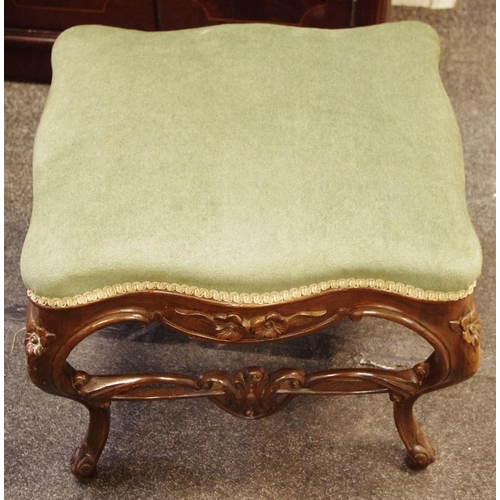 475 - A walnut footstool, stuffed serpentine rectangular seat, French cabriole legs, pierced and carved st... 