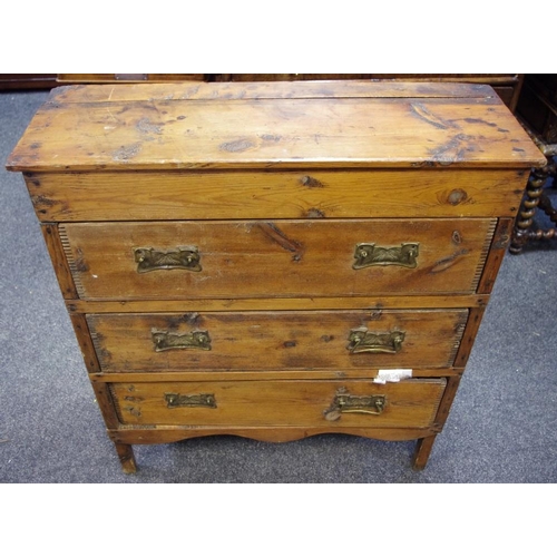 479 - An early 20th century pine chest, of shallow proportions, slightly oversailing rectangular top above... 