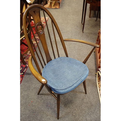 484 - An Ercol hall chair, swan splat