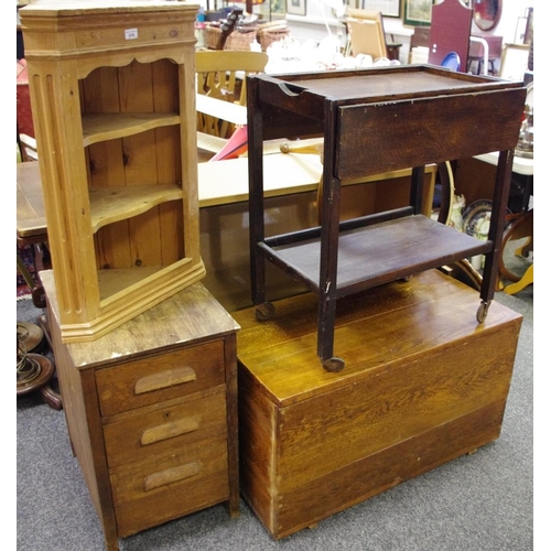 516 - A modern pine wall mounted corner cabinet; a walnut veneered occasional table; an oak three drawer c... 