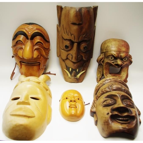 55 - Six Oriental theatre masks, various countries including Japan; Indonesia,etc