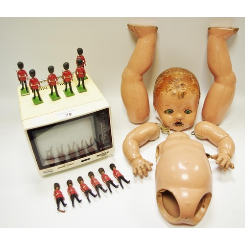 79 - Britain's lead soldiers, Queens Guards;  a Tatung television, 1970;  a composite doll, c.1940