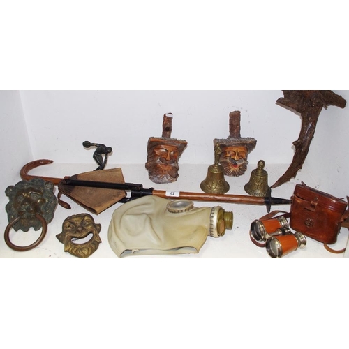 82 - An MF1 chemical prevention gas mask; a lion door knocker; pair of binoculars; a walking stick combin... 