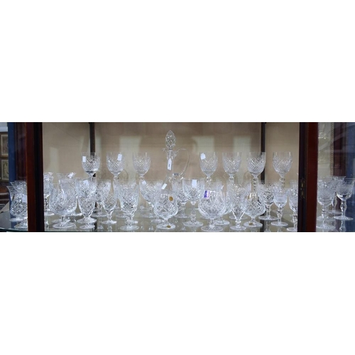 56 - A cut glass decanter; a quantity of cut glass stemware, various sizes, shapes and patterns