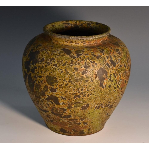 3224 - A Mediterranean/Roman ovoid terracotta vase, matte-mottled surface, 15cm high