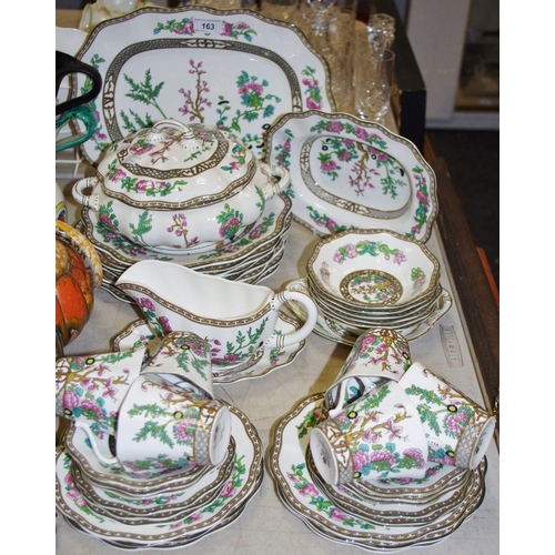 163 - A Coalport Indian Tree pattern dinner service, including vegetables dish and cover, sauce boat, cups... 