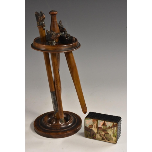 3414 - An early 20th century novelty softwood desk etui, the circular stand with dip pen, letter knife and ... 