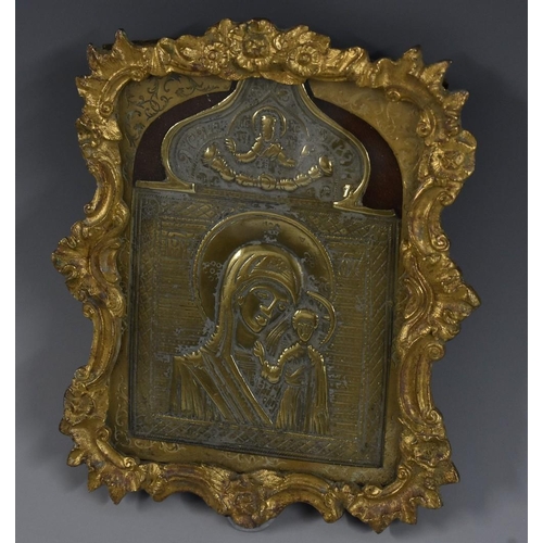 3425 - An Eastern Orthodox brass icon, in relief with Madonna and Child, 10.5cm x 7.5cm, gilt bronze frame