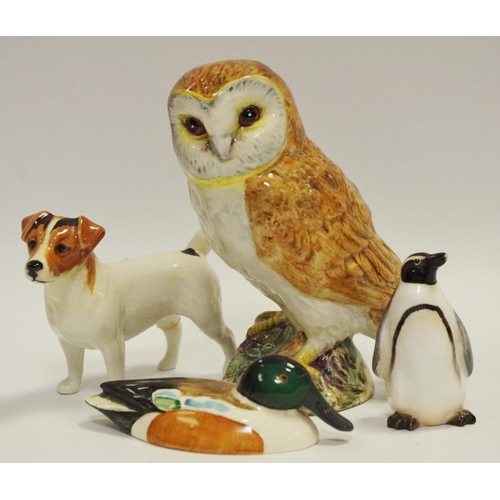 24 - A Beswick Barn Owl impressed marks, no 2026; a Beswick duck; a penguin and fox hound (4)